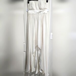 Elegant White Pleated Dress with Embellished Waist